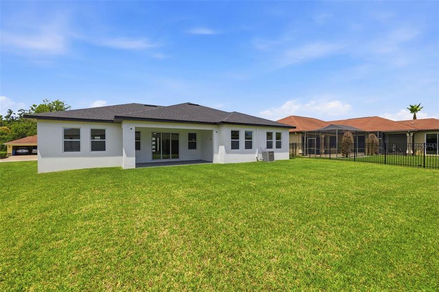 Exterior details and patio area of a home in , Brooksville (Image 4).