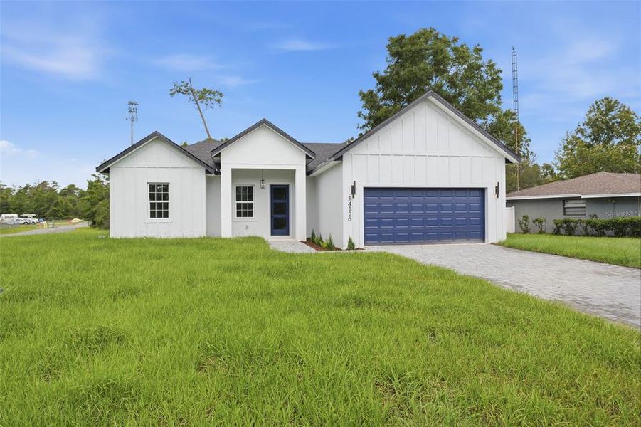 Front exterior of a new home in , Ocala, FL, highlighting curb appeal (Image 19).
