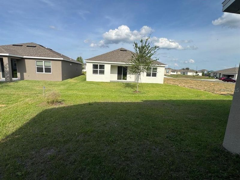 Exterior details and patio area of a home in Cypress Park Estates, Haines City (Image 3).