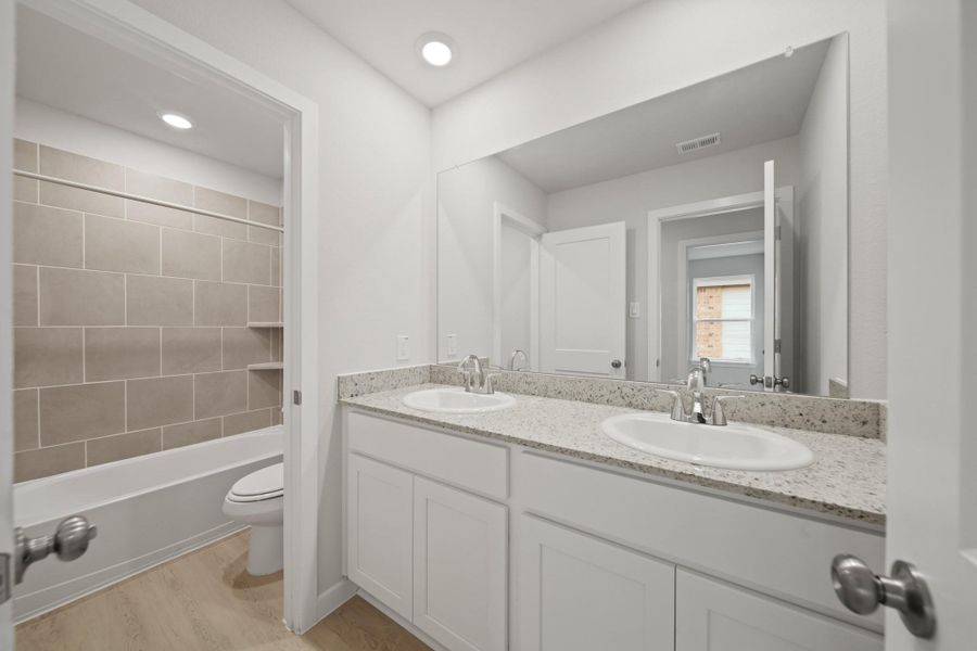 Furnished interior view inside a new home in Riverwood Ranch, Angleton (Image 9).