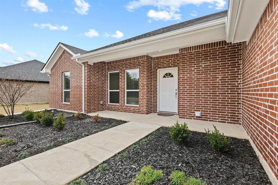 Exterior details and patio area of a home in , Ector (Image 3).