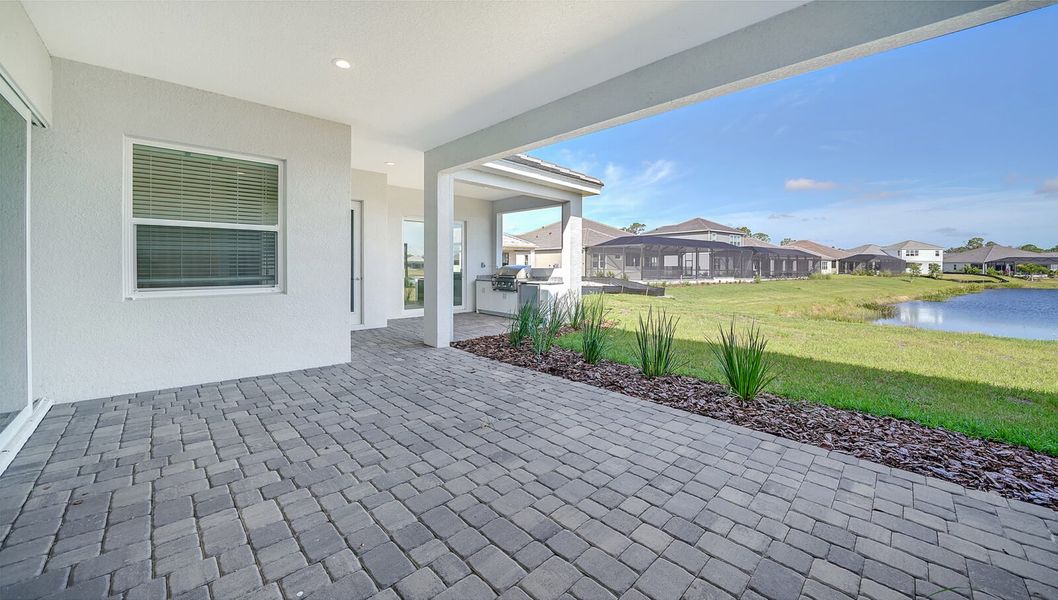 Exterior details and patio area of a home in Grand Palm, Venice (Image 17).