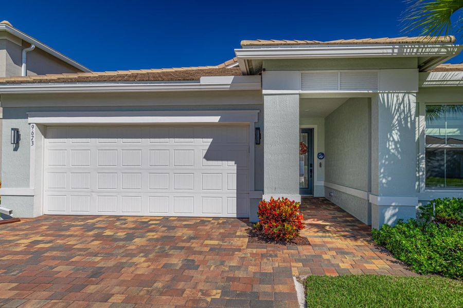 Exterior details and patio area of a home in Windsong Estates, Lake Worth (Image 29).