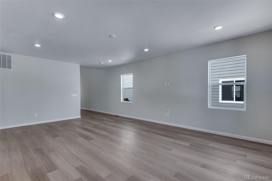 Spacious, unfurnished interior of a new home in Medley at Reunion Ridge, Commerce City (Image 30).