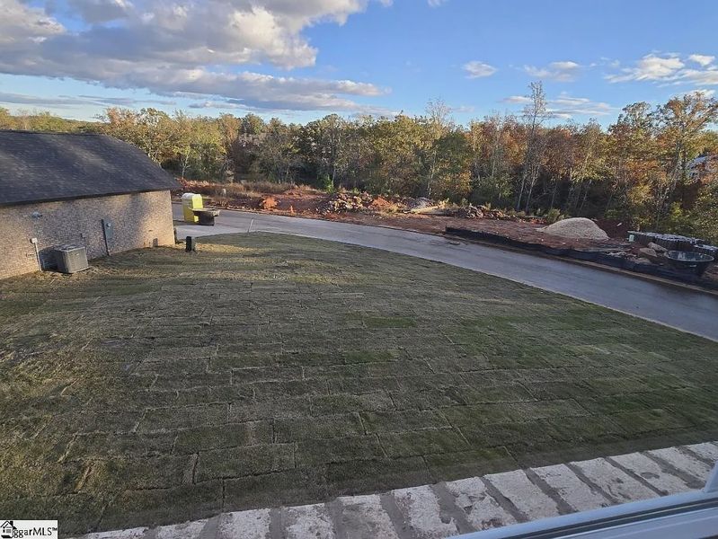 Exterior details and patio area of a home in Hidden Lake Estates, Greenville (Image 3).