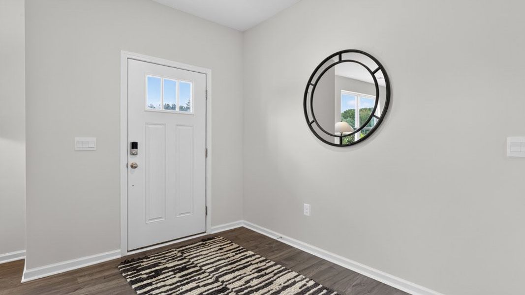 Spacious, unfurnished interior of a new home in The Townes at Anderson Farm, Wendell (Image 19).