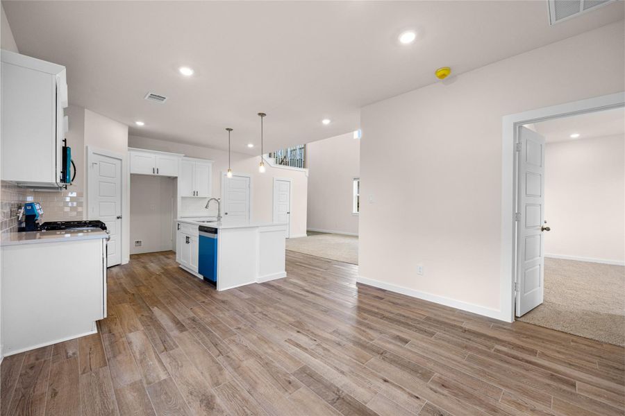 Spacious, unfurnished interior of a new home in Creekhaven, Iowa Colony (Image 17).