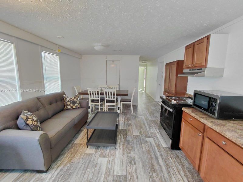 Furnished interior view inside a new home in , Clewiston (Image 8).