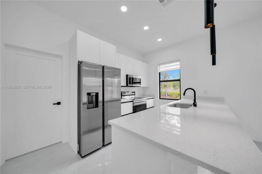 Furnished interior view inside a new home in , Lehigh Acres (Image 6).