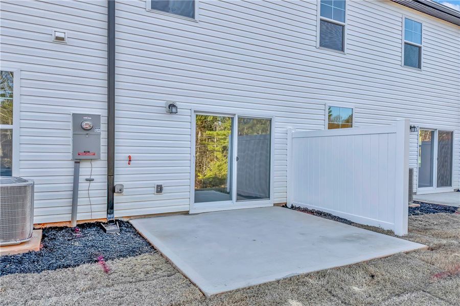 Exterior details and patio area of a home in Meece Townhomes, Easley (Image 19).
