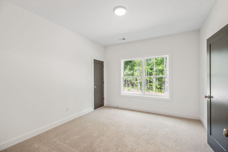 Spacious, unfurnished interior of a new home in Flint Farms, Concord (Image 41).