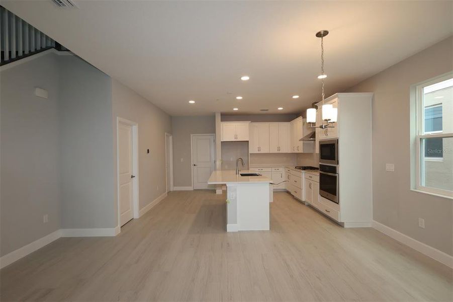 Furnished interior view inside a new home in Lake Star at Ovation, Winter Garden (Image 9).