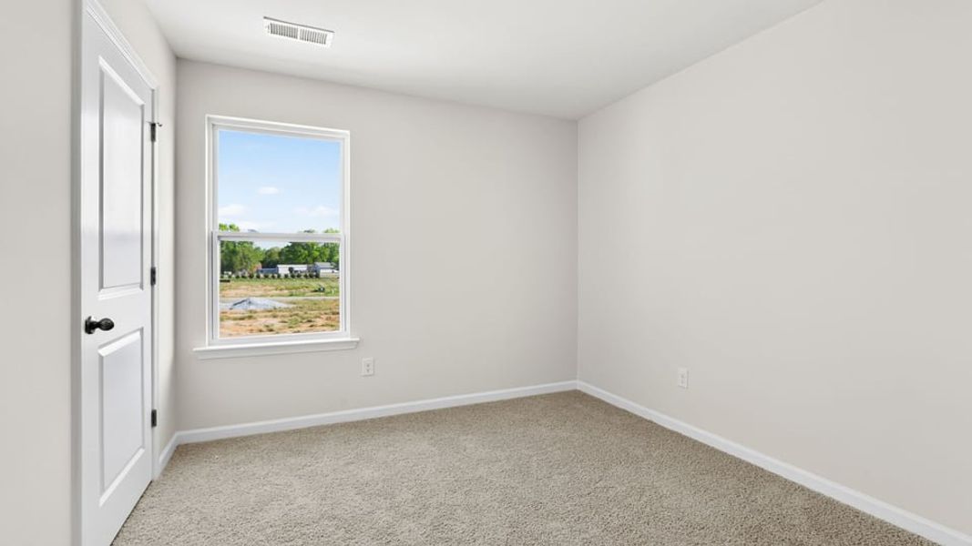 Spacious, unfurnished interior of a new home in Durbin Meadows Traditions, Fountain Inn (Image 28).