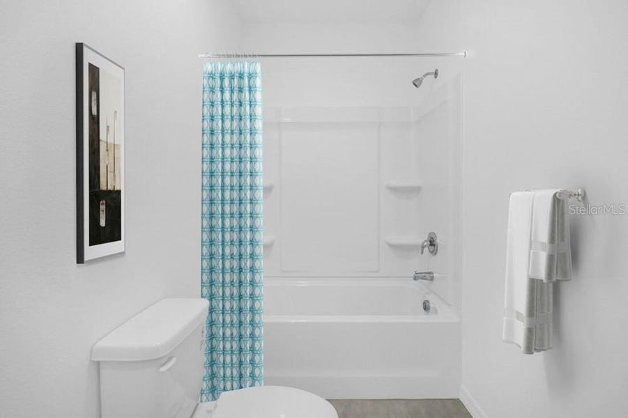 Furnished interior view inside a new home in Waterstone, Groveland (Image 35). Furnished interior view inside a new home in Waterstone, Groveland (Image 35).