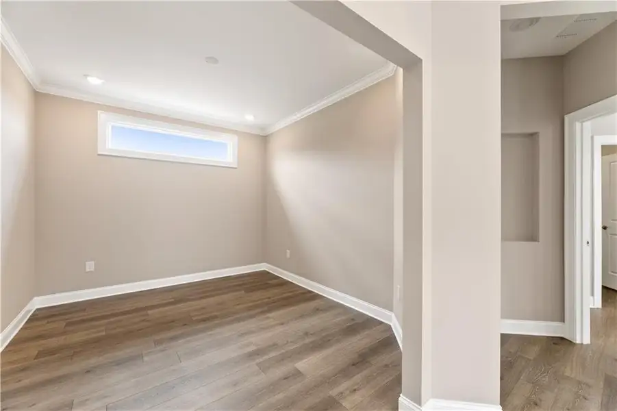 Spacious, unfurnished interior of a new home in The Courtyards at Bailey Farms, Dacula (Image 17).
