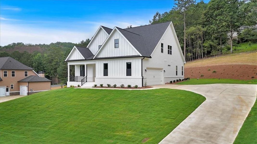 Front exterior of a new home in , Rome, GA, highlighting curb appeal (Image 27).