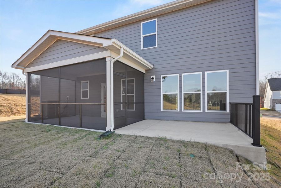 Exterior details and patio area of a home in Forest Creek, Waxhaw (Image 22).