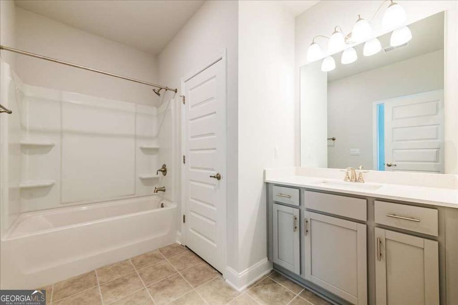 Furnished interior view inside a new home in Carson's Walk, Macon (Image 13).