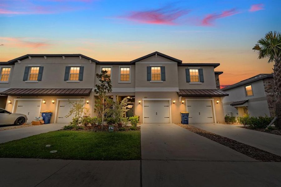 Front exterior of a new home in , San Antonio, FL, highlighting curb appeal (Image 2).
