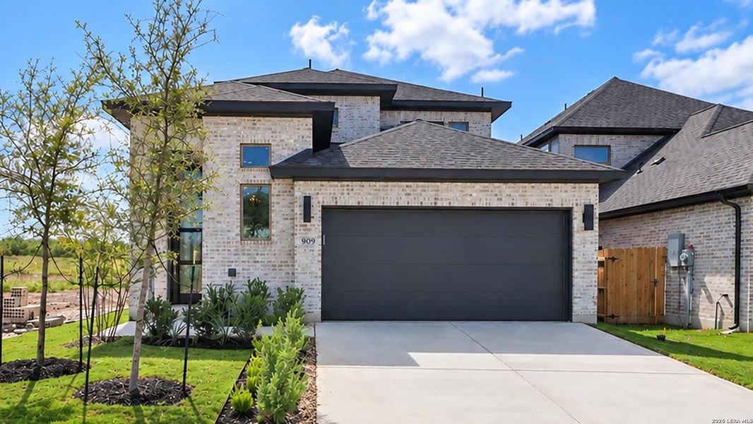 Front exterior of a new home in Legacy at Lake Dunlap, New Braunfels, TX, highlighting curb appeal (Image 21).