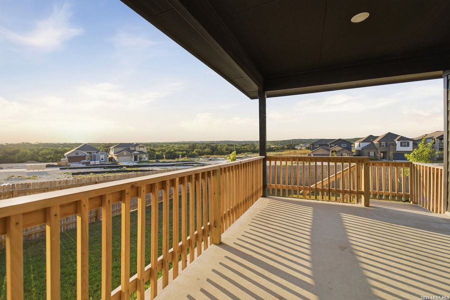 Exterior details and patio area of a home in The Woodlands at Medina Hills, Mico (Image 4).
