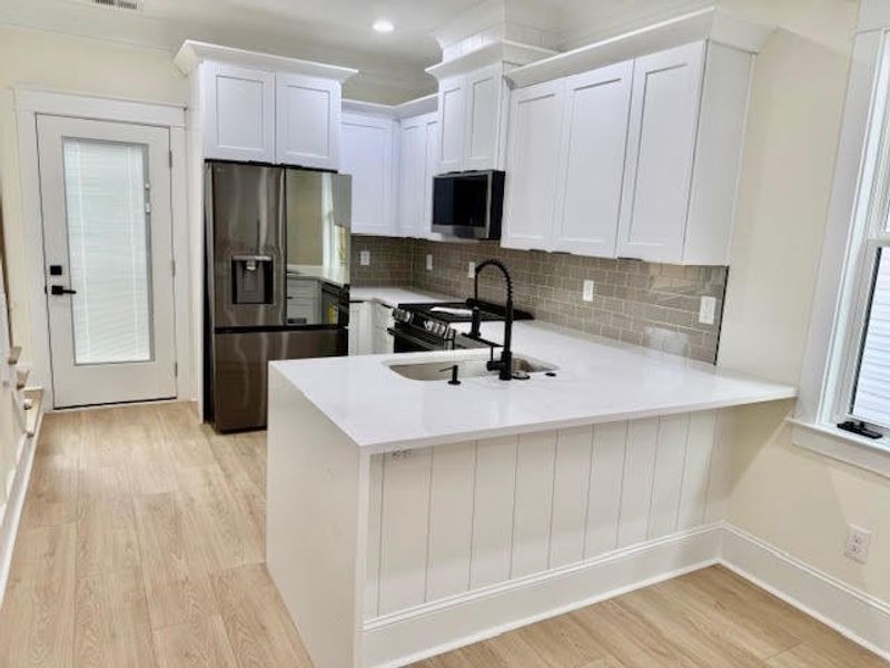 Furnished interior view inside a new home in , North Charleston (Image 5).