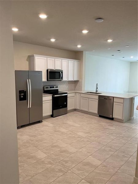 Furnished interior view inside a new home in , Davenport (Image 5).