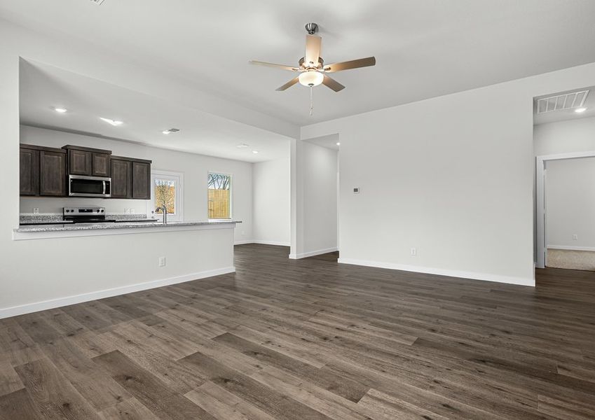 The living room sits right off of the kitchen and dining room.