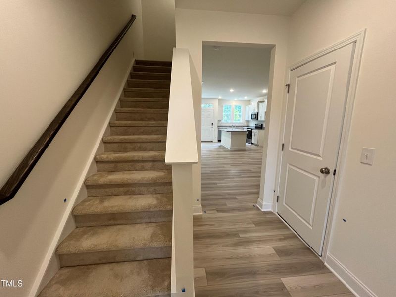 Back Hallway leading to half bath/Garage
