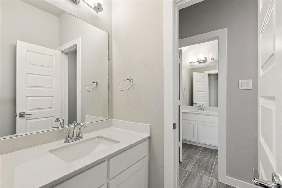 Bathroom in the Morrison home plan by Trophy Signature Homes – REPRESENTATIVE PHOTO Bathroom in the Morrison home plan by Trophy Signature Homes – REPRESENTATIVE PHOTO
