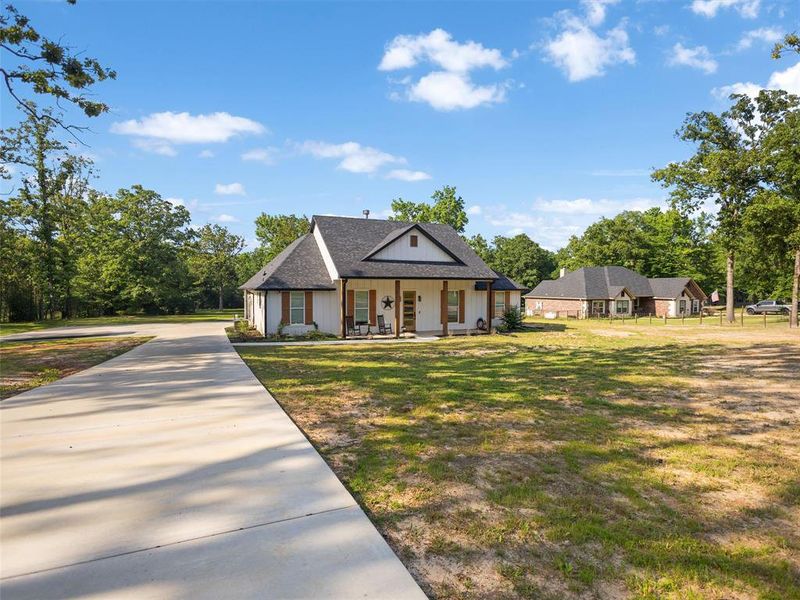Front exterior of a new home in , Gladewater, TX, highlighting curb appeal (Image 2). Front exterior of a new home in , Gladewater, TX, highlighting curb appeal (Image 2).