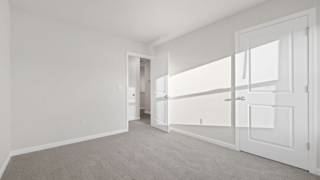 Spacious, unfurnished interior of a new home in Bentley Park, Greenwood (Image 25). Spacious, unfurnished interior of a new home in Bentley Park, Greenwood (Image 25).
