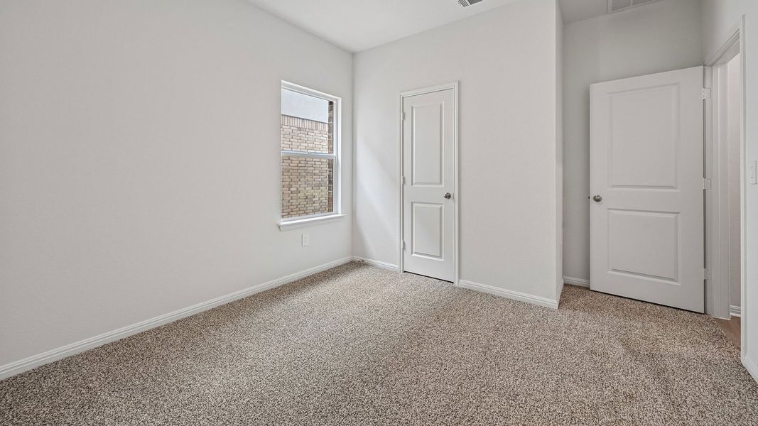 Spacious, unfurnished interior of a new home in Bar W Ranch, Leander (Image 30).