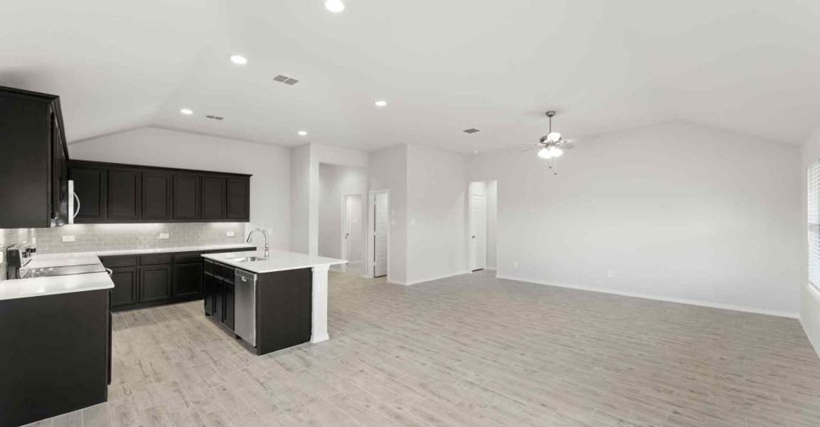 Representative exterior photo of a completed home built from the Atlanta by Impression Homes in Keeneland, Aubrey, TX (Image 8).