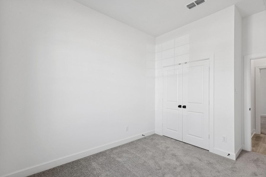 Spacious, unfurnished interior of a new home in Meridiana 55' Homesites, Manvel (Image 19).