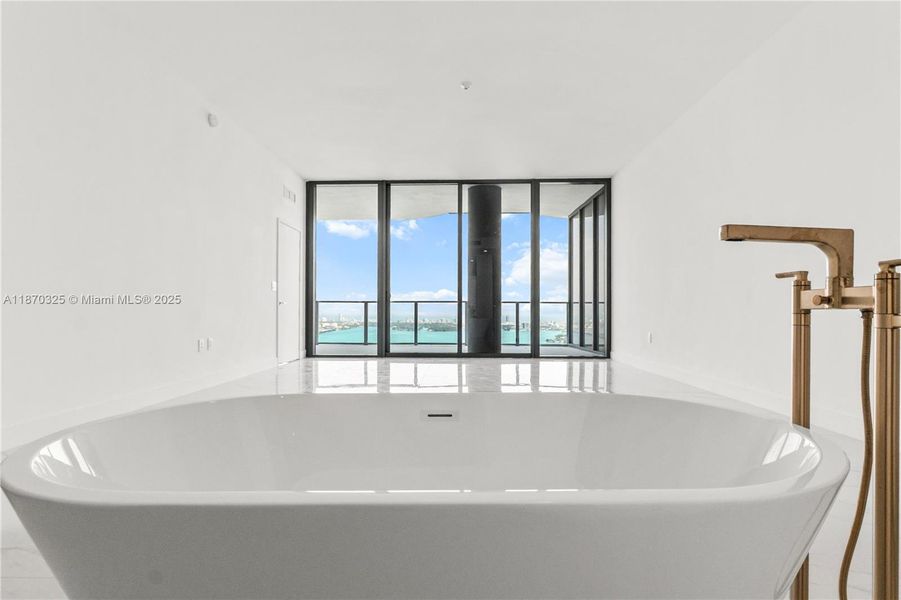 Furnished interior view inside a new home in Aria Reserve, Miami (Image 10).
