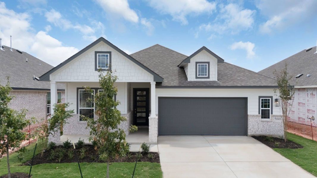Front exterior of a new home in Nolina, Georgetown, TX, highlighting curb appeal (Image 1). Front exterior of a new home in Nolina, Georgetown, TX, highlighting curb appeal (Image 1).