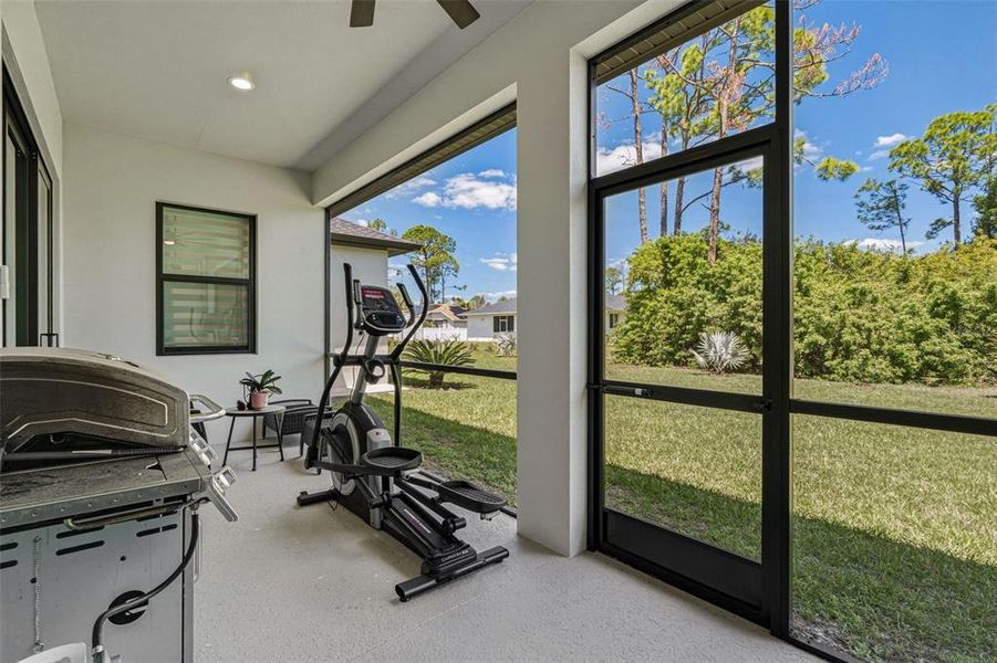 Exterior details and patio area of a home in , North Port (Image 24).