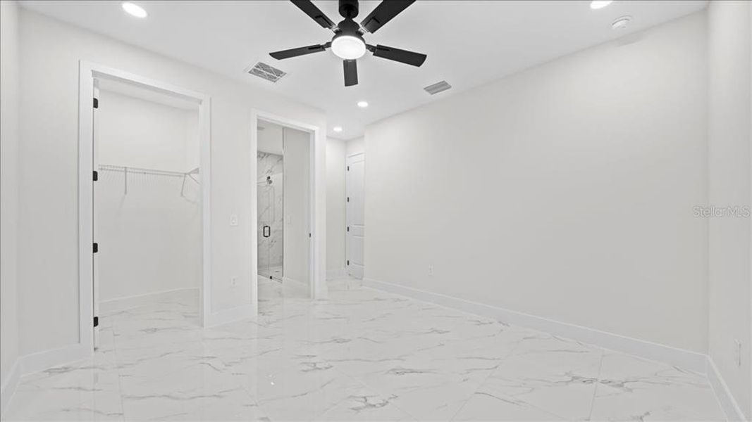 Spacious, unfurnished interior of a new home in , Port Charlotte (Image 24).