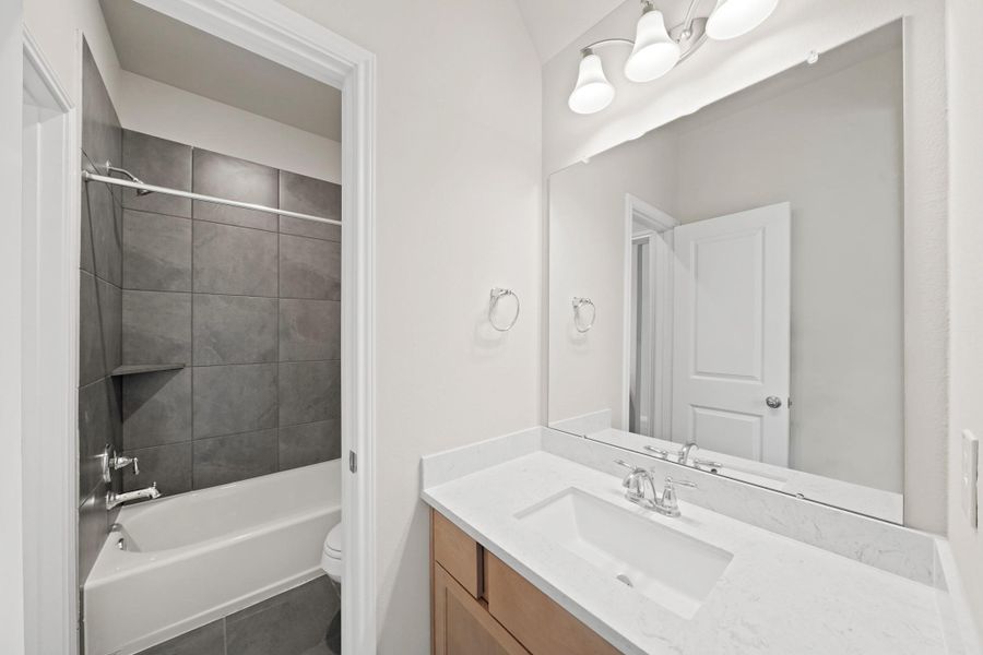 Furnished interior view inside a new home in Bridgeland 55', Cypress (Image 10). Furnished interior view inside a new home in Bridgeland 55', Cypress (Image 10).