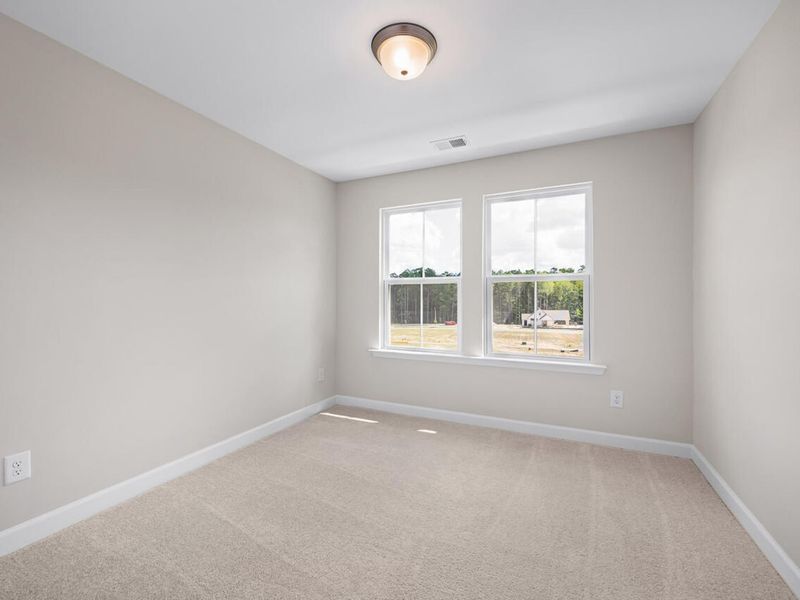 Spacious, unfurnished interior of a new home in Forestville Yard Townhomes, Knightdale (Image 18).