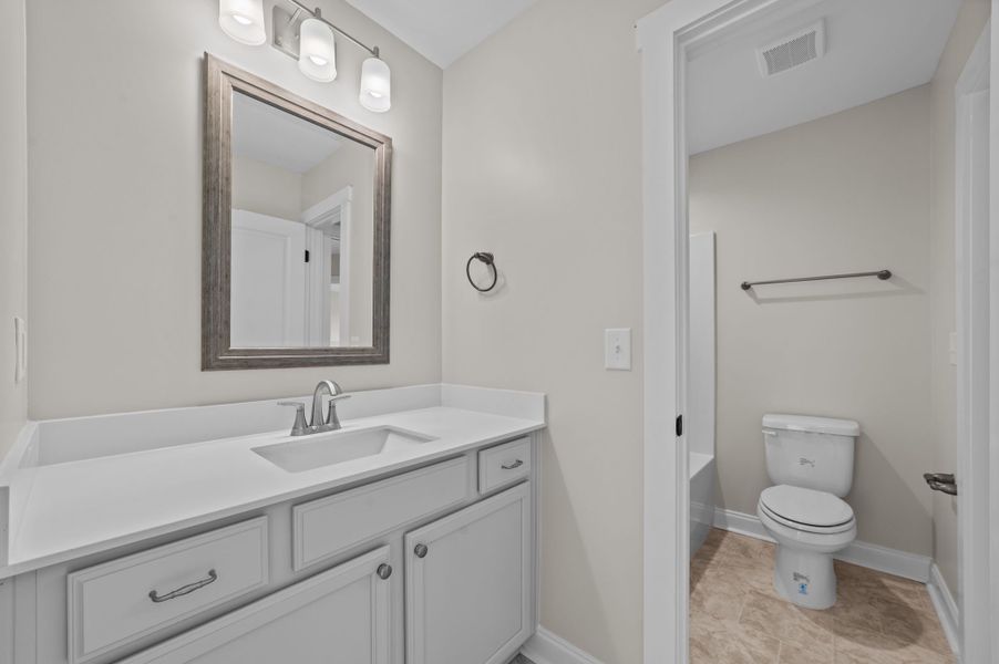 Furnished interior view inside a new home in Eli's Ridge, Winterville (Image 15).