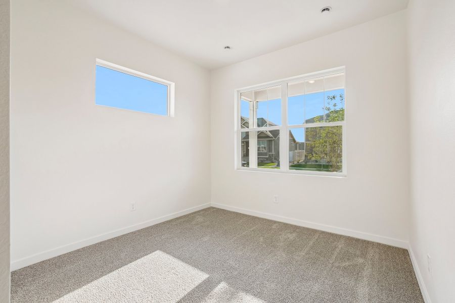 Spacious, unfurnished interior of a new home in Union Colony West, Greeley (Image 33).