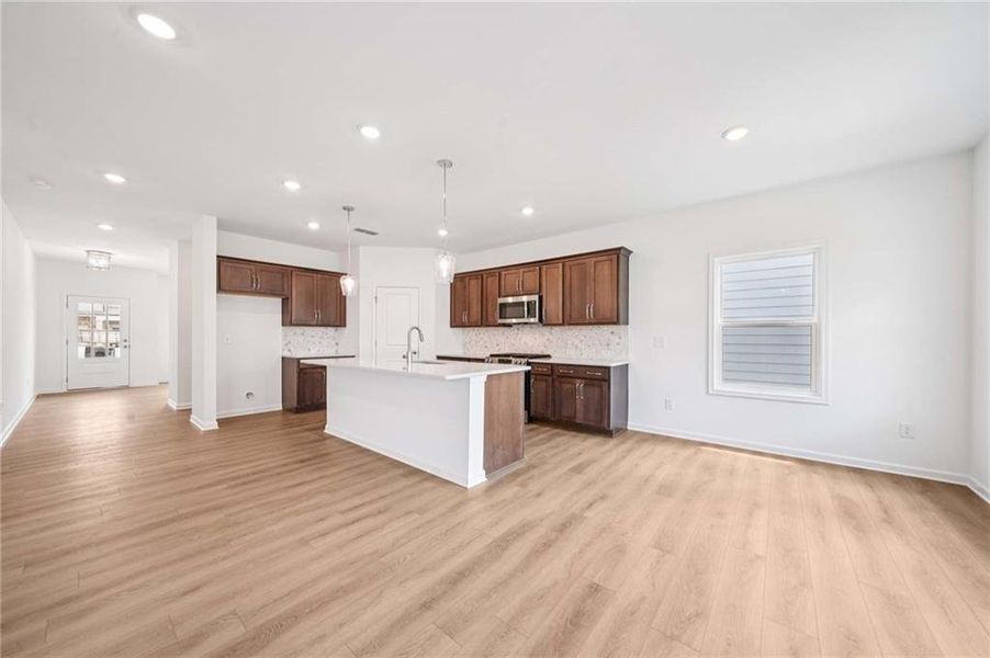 Furnished interior view inside a new home in Eastlyn Crossing, Flowery Branch (Image 7).