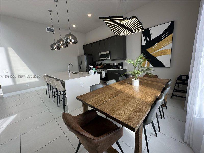 Furnished interior view inside a new home in , Kissimmee (Image 6).