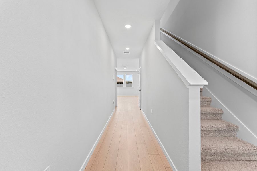 Lot 20 Ponderosa II Entryway with Hallway and Stairs at Camden Woods in Kingsland, GA