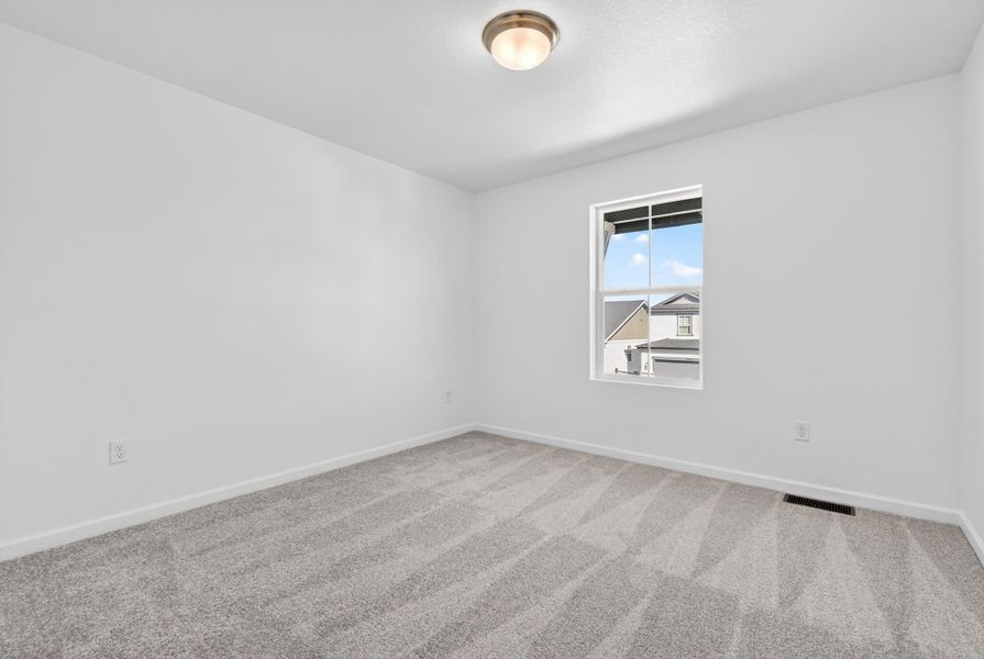 Spacious, unfurnished interior of a new home in Macanta, Castle Rock (Image 22).