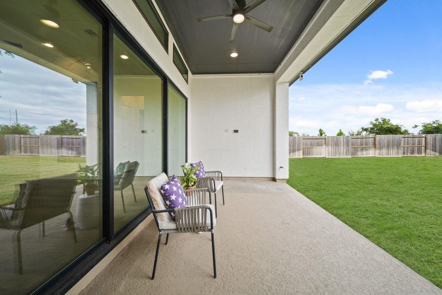 Cozy covered back patio - NOTE the GAS LINE already in place for your outdoor kitchen! Cozy covered back patio - NOTE the GAS LINE already in place for your outdoor kitchen!