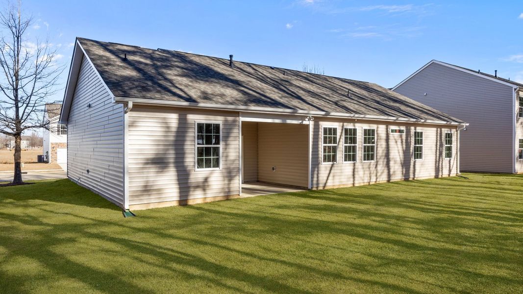 Exterior details and patio area of a home in Tyler - Home on the Lake, New Bern (Image 23).