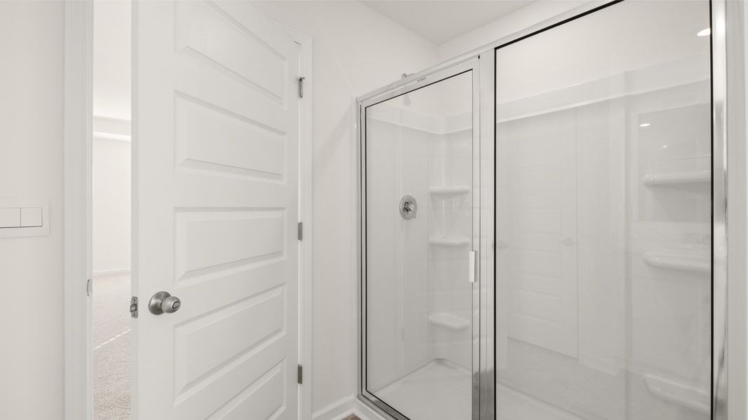 Representative unfurnished interior of a home built from the Mansfield by D.R. Horton in Brooks Station, Dacula (Image 23).